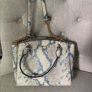 Michael Kors snake skin print satchel.
